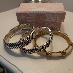 Assorted silver and ivory bangles